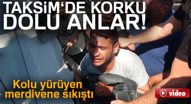 Taksim Meydanı nda kolu yürüyen merdivene sıkışan şahsı itfayie kurtardı