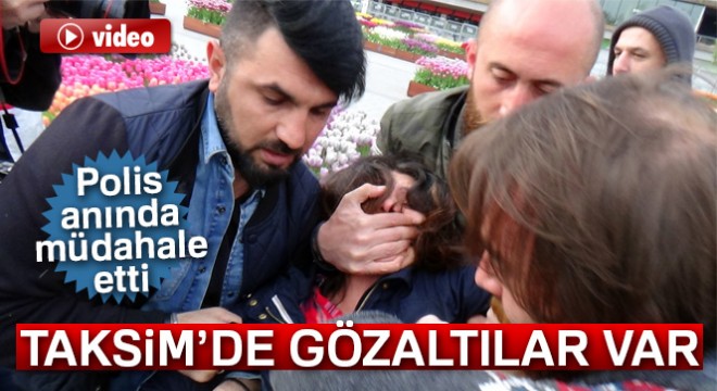 Taksim de pankart açan iki kadın gözaltına alındı